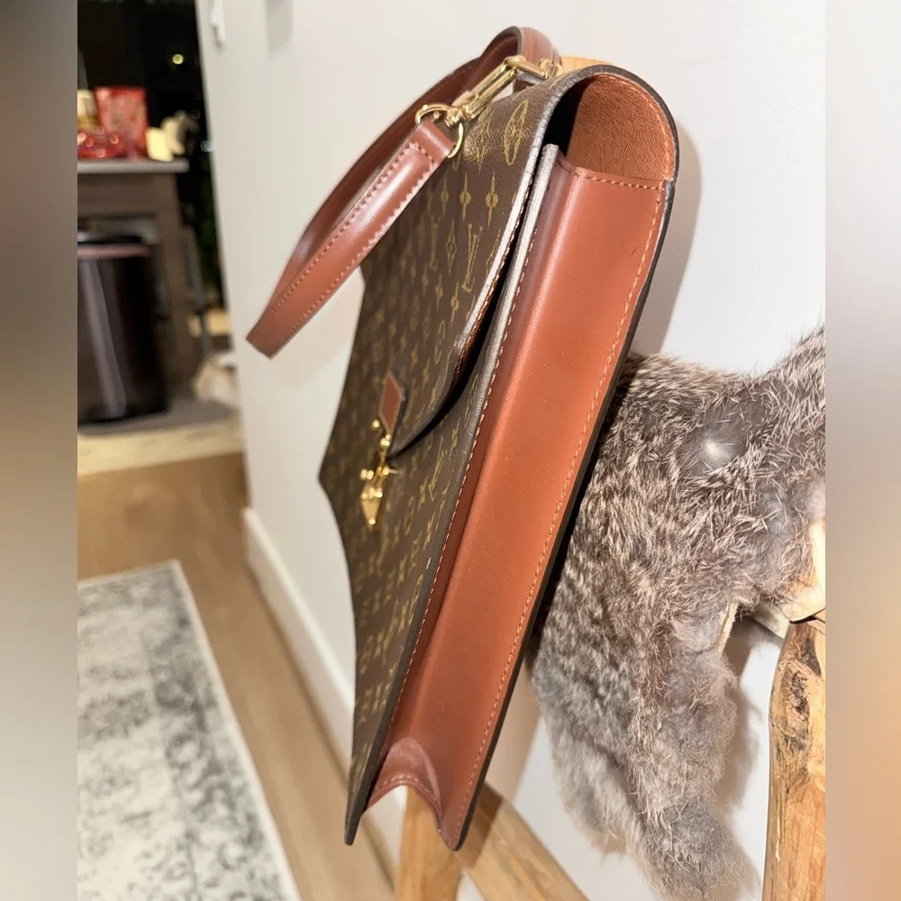 LOUIS VUITTON Monogram Porte Documents Bandouliere Bag.